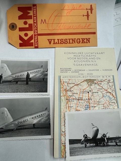 KLM PH-AKK three original photographs of Douglas DC-2-115E named Koetilang. on Schiphol Airport on 13 July 1938 (departed 17.30 hrs to Vlissingen) with original luggage tag named to Ossenwaarde and Routekaart of KLM (Koninklijke Luchtvaartmaatschappij v